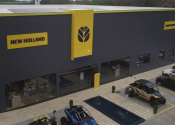 As lojas remodeladas da New Holland contam com espaço de Coworking, café e até churrasqueira. Foto : New Holland